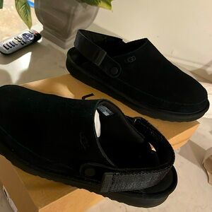 Black on black suede ugg clogs